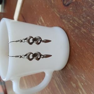 Silver tone dangly earrings